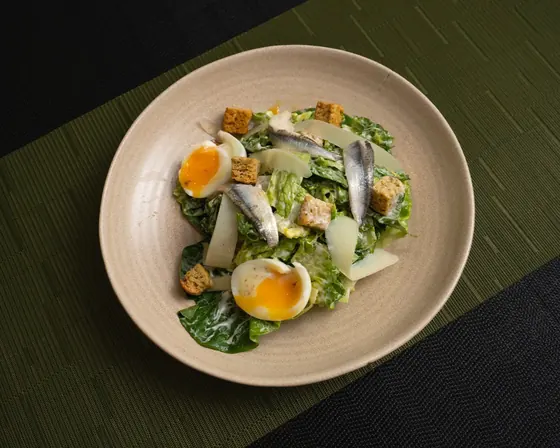 A freshly prepared salad, photographed at Olive & Oak