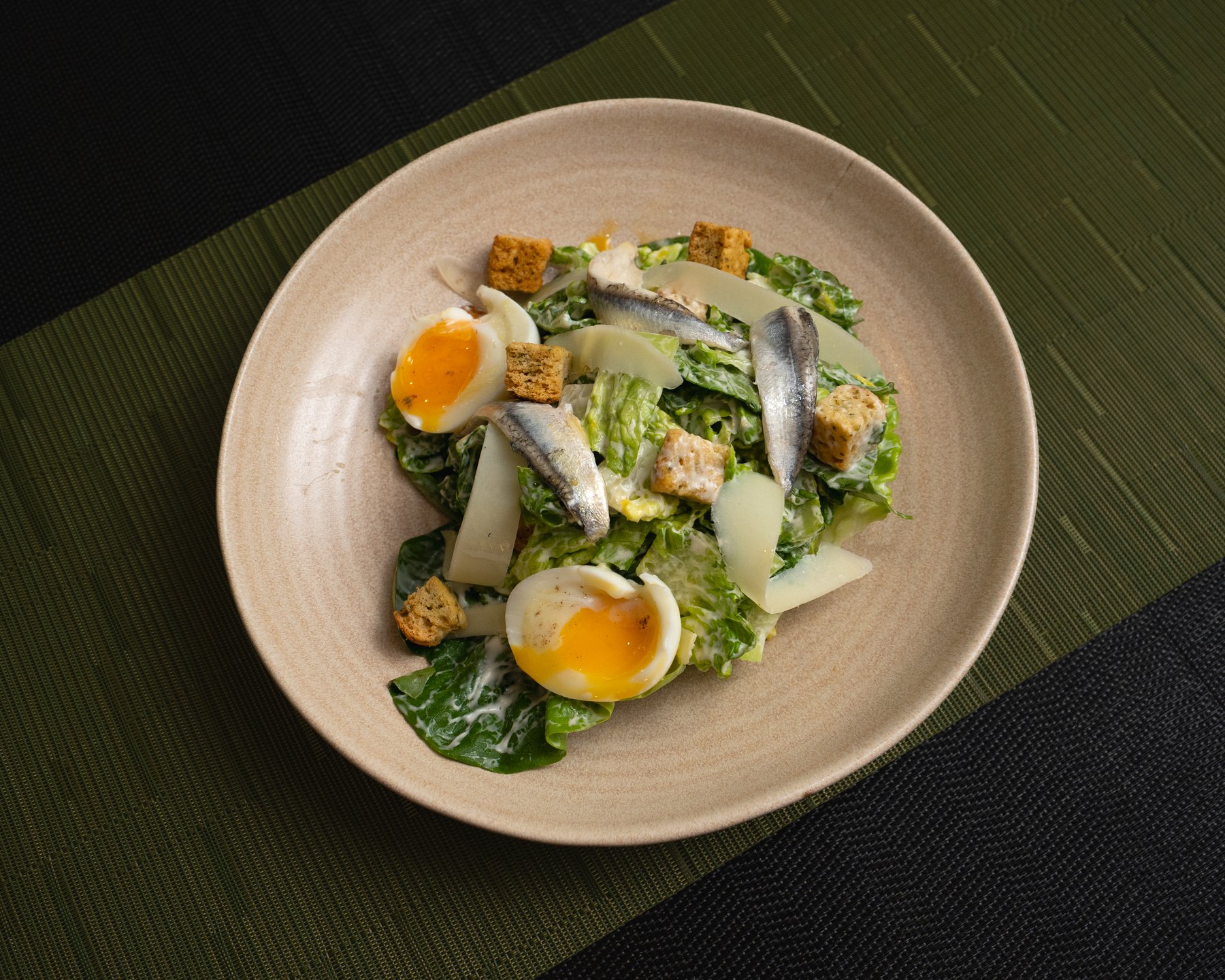 A freshly prepared salad, photographed at Olive & Oak